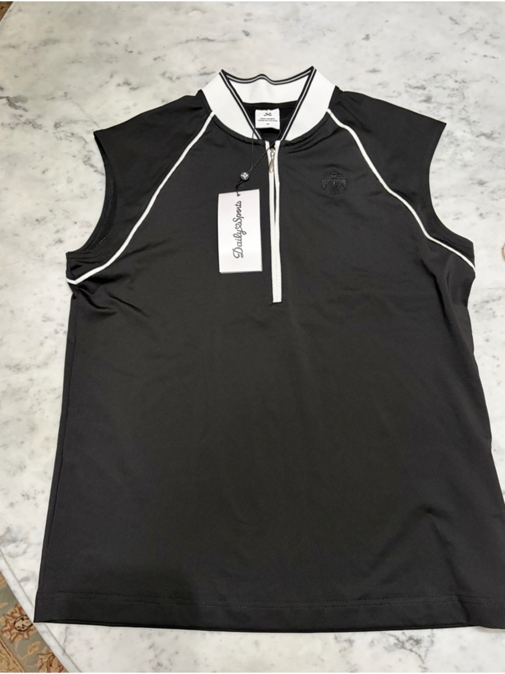 Daily sports Zip Polo with White Trim from pro shop at Thunderbird Country Club
